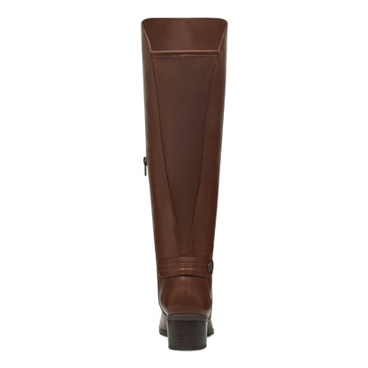 Embrace a modern silhouette that's sure to garner plenty of compliments with Anne Klein smooth leather Jela boot. Jela has a pull-on design with a half-zip closure at the side and a stretch panel at the back for added comfort. Jela's insole has dual, lightweight foam layers to provide cushioning and shock-absorption as well as a durable rubber outsole